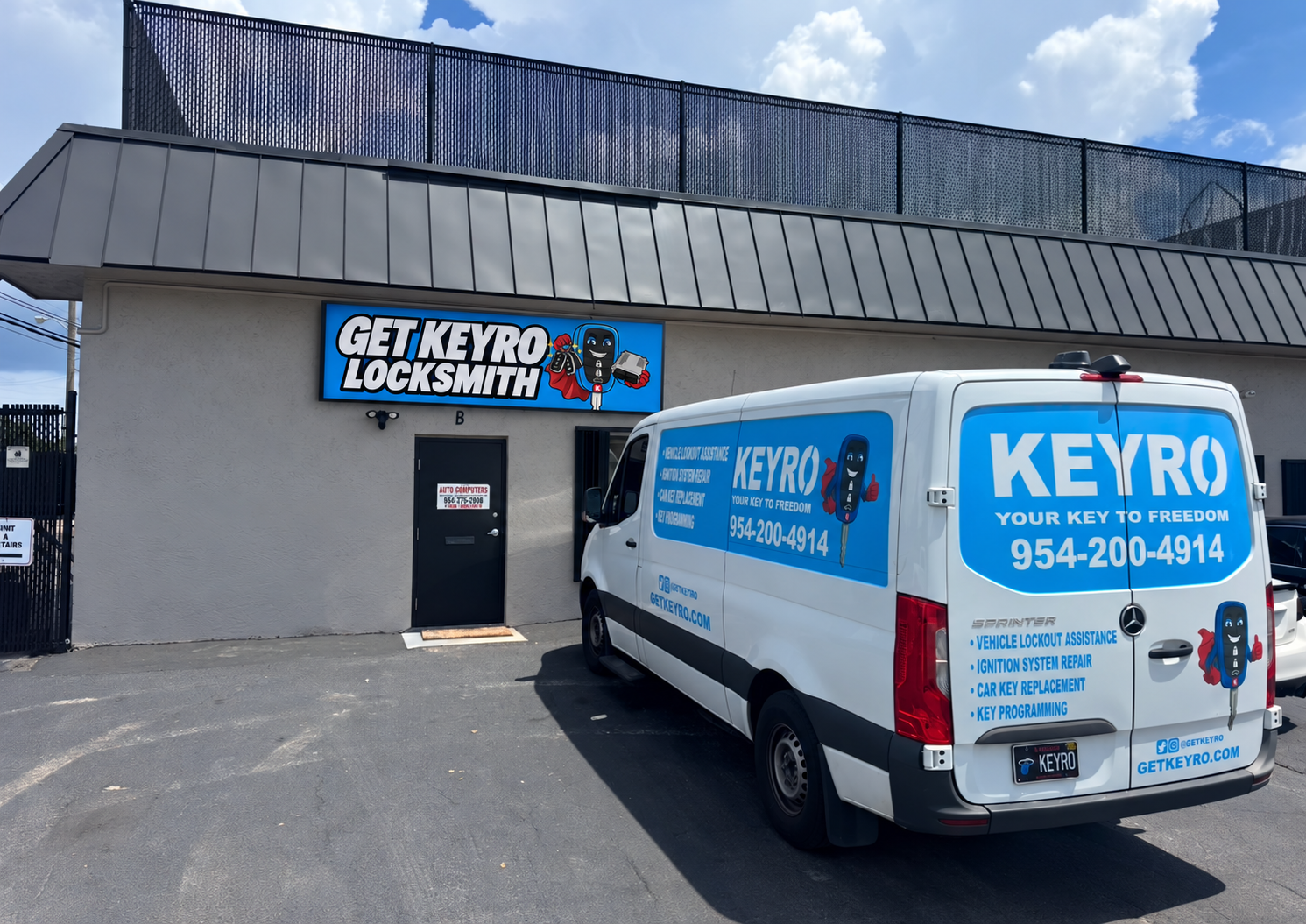 Storefront sign mockup showing the proposed GET KEYRO LOCKSMITH mascot sign above Unit B beside a KEYRO van